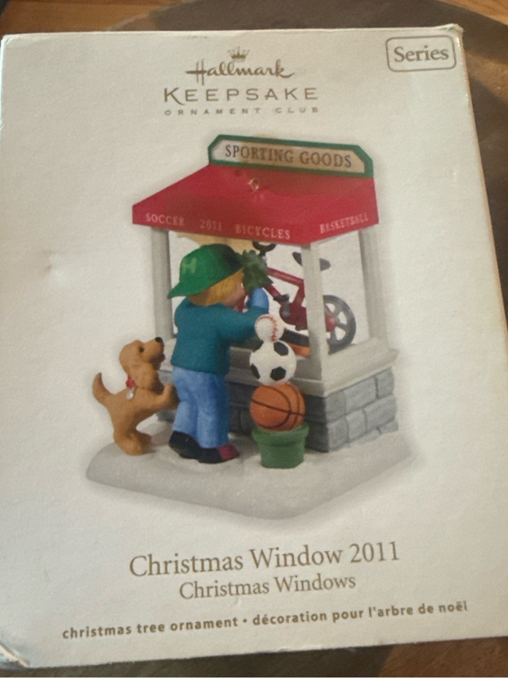 Hallmark Keepsake Christmas Window 2011 Ornament - red, green, blue, tan